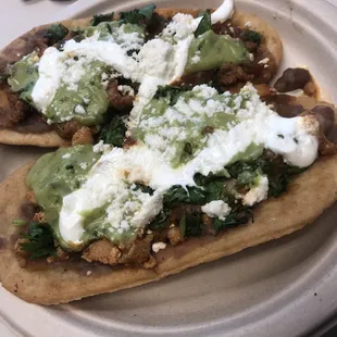 One chicken and one al pastor Huarache. $5 each