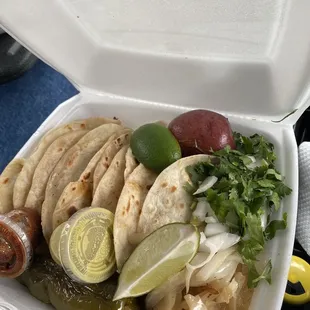 Tacos de barbacoa and fajita, the barbacoa is really good has lots of flavor with the flower tortilla best combo, the fajita is ok