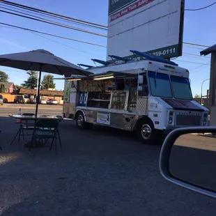 a food truck parked in a parking lot