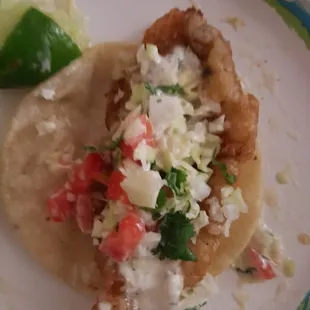 I get light cabbage.. Decent size tacos for a dollar each...these are my favorite fish tacos from anywhere local