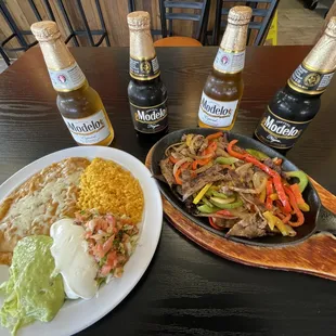 Carne Asada Fajitas dinner plate and imported beer