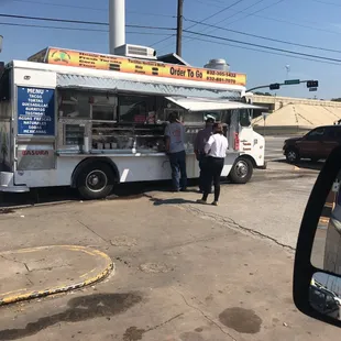 Alex ordering us some tacos and drinks