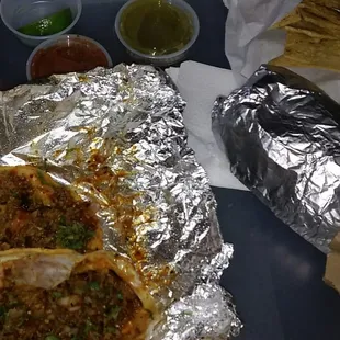 Sooo good two tacos al pastor super burrito carne asada
