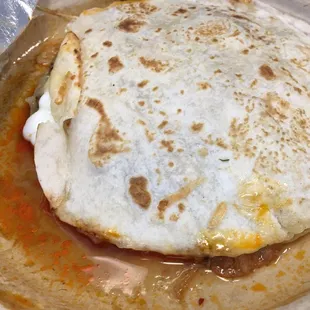 Super Quesadilla $5.50. Al pastor pork meat. Guacamole, sour cream, lettuce. Wet lettuce?