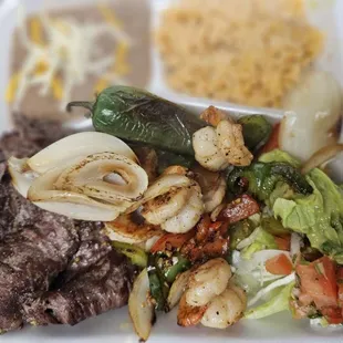 a meal in a styrofoam container