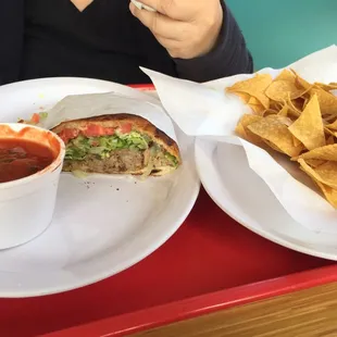 Carnitas Torta with chips and salsa!