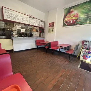 4 booths inside. There is a front patio with a table also.