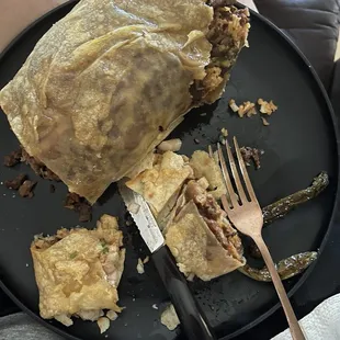 The most disgusting burrito I&apos;ve ever had had to cut it because there was holes in the tortilla.