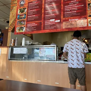 One of their descriptive menus inside. Cashola only!