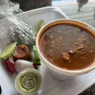 Medium cup of consume and meat