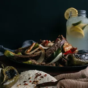 Combo fajitas for two with our agua fresca de Limonada