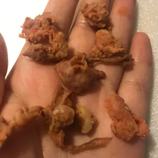 a handful of fried food