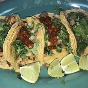 2 pollo asada &amp; 2 carne asada tacos. Meat is very juicy.
