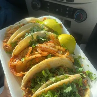 These are chicken and steak tacos and you can clearly see they only put onions on one. poor service and nasty food.