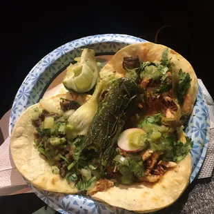 These are carne asada  and pollo tacos. They&apos;re  $3 each per taco.