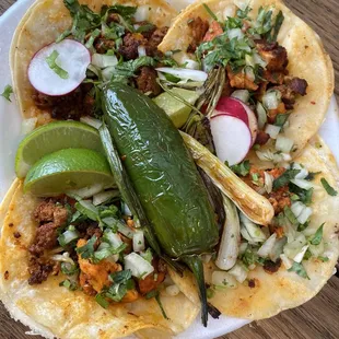 Tacos. We didn&apos;t order chicken but found chicken in ours