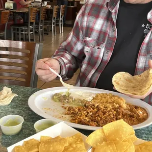 a man eating at a restaurant