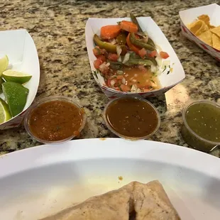 Salsa trio with pico, carrots, and limes