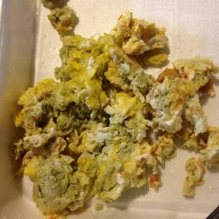 This is suppose to be scrambled eggs clearly they are green &amp; smell rotten. Usually we enjoy the food but not today wont go back