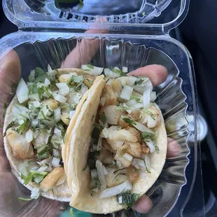 2 Fish Tacos price was 5.99$ Muy poco pescado!