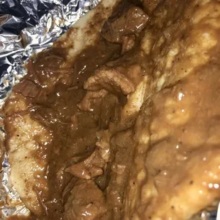 a piece of meat and sauce