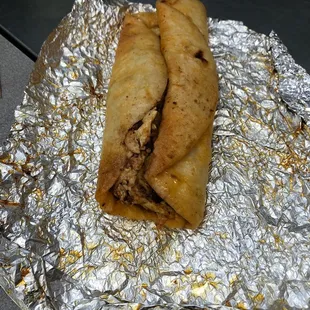 So much grease on my taco I can't even understand why the way that it was made is no good they taste the flavor no good