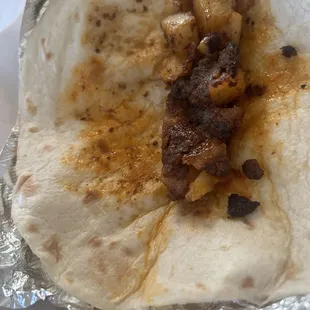 Almost nothing in my Potato and chorizo taco