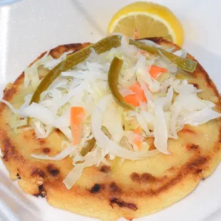 Chicken Pupusa (the vinegary slaw on top was great): Taqueria Aztlan