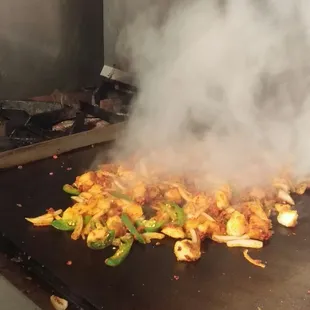 smoke coming out of the grill