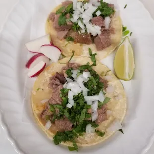 Tacos de carnitas $2,00