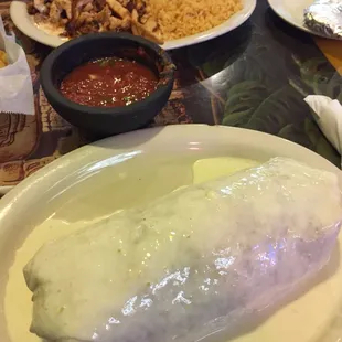 a burrito and a side of rice