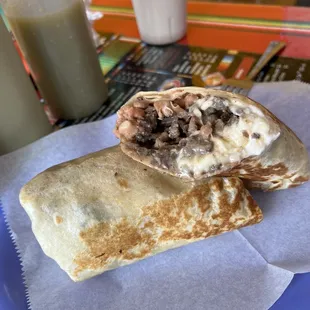 Burrito carne Asada (steak) with only beans, cheese and sour cream.