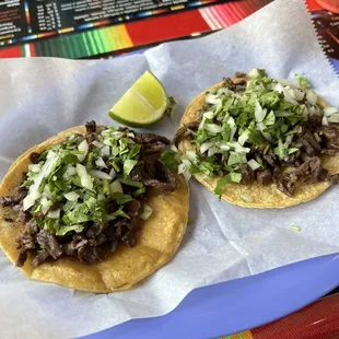 Steak Tacos , only onions and cilantro.