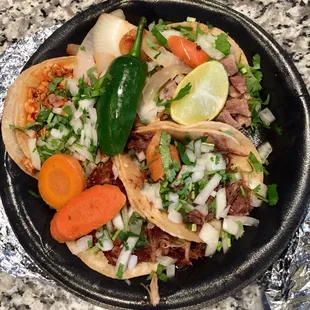 Barbacoa, lengua, carnitas and pollo tacos $5.92