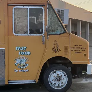 a yellow food truck