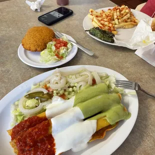 Assorted flautas, gordita de maíz, loaded hamburger