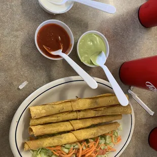 Flautas before the toppings. I asked for them on the side.