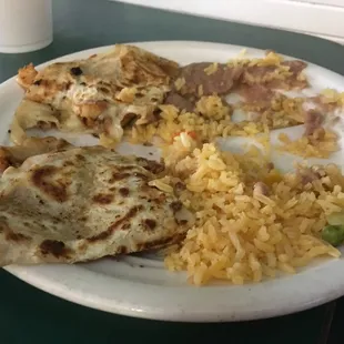 Kids chicken quesadillas with rice and beans... he couldn&apos;t wait