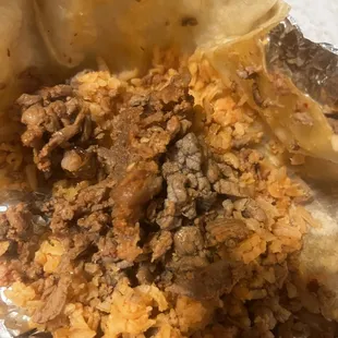 Regular burrito with no meat, onions, or peppers. Only rice and meat in this one...