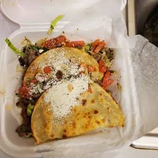2 crispy tacos with tons of meat
