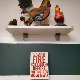 a fire extinguiser and a rooster