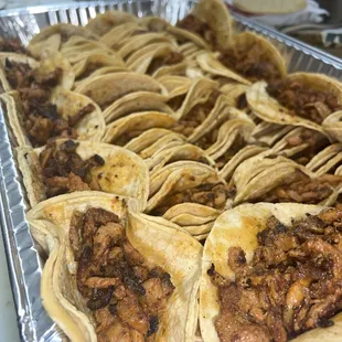 a tray of taco shells