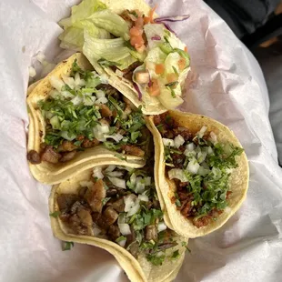 Tacos (Chorizo, Pescado Frito, Al Pastor)