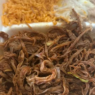 Birria plate with beans rice