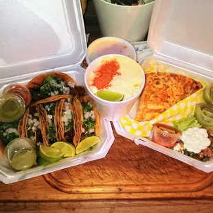 6 spicey shredded beef tacos, huge chicken quesidilla and 2 esquites. $34 + $6 tip