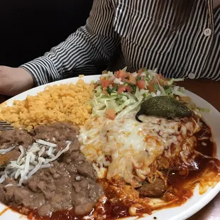 Plato Tampiqueña: Enchilada, steak, pinto retried bean, Spanish rice, and a vegetable side. It was huge that we had to take a box!