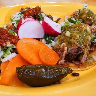 2 carnitas and 2 Carne asada tacos