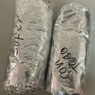 Super burrito in the left, regular on the right. You be the judge.