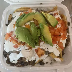 Steak nachos. Unfortunately the chips were extremely stale this time. But hey, fresh avocado!