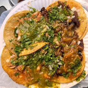 Chicken and Al Pastor tacos.